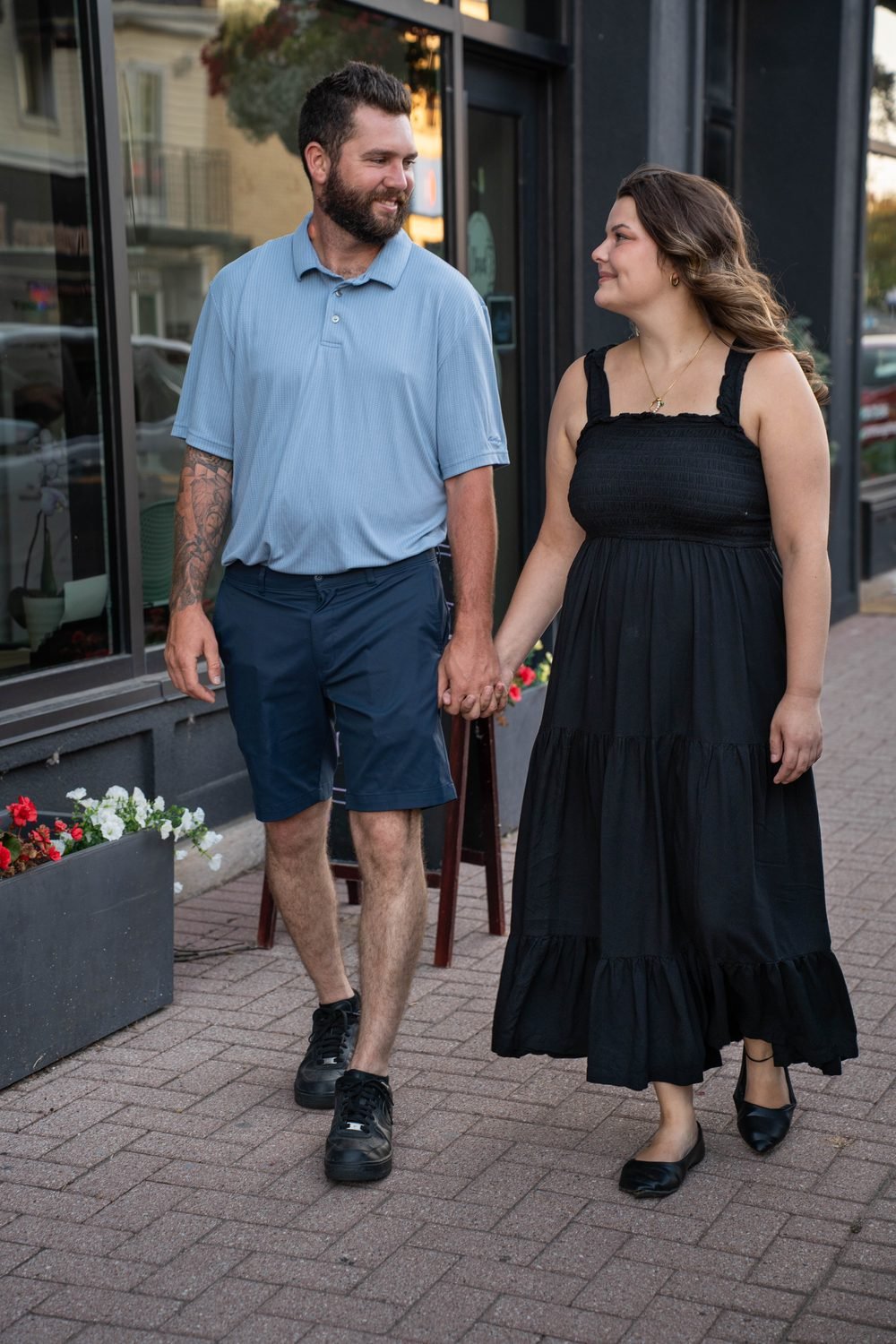 Couple walking through downtown Amherstburg, Ontario