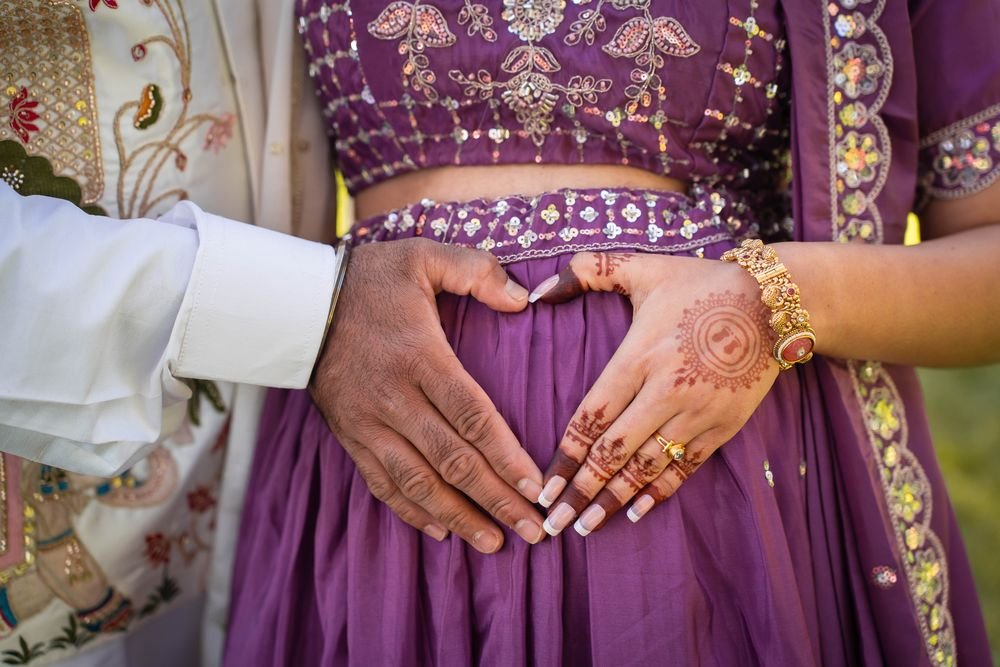 Heart hands on a baby bump at a Windsor maternity session
