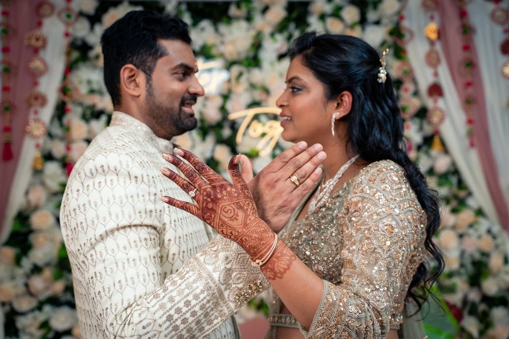 Couple detail shot showing wedding rings at a South Asian wedding near Windsor